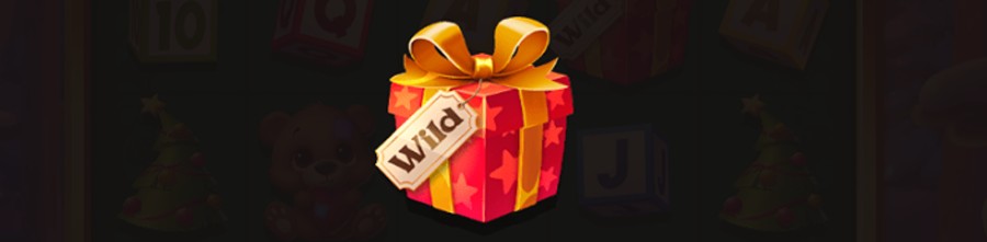 Rött och guldigt paket med en lapp med texten "wild" från Xmas Drop.